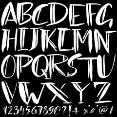 Hand drawn font made by dry brush strokes. Grunge style alphabet
