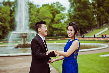 Wedding couple on the background of the fountain