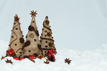 Christmas tree from white lace on snow