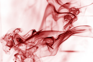 Toxic fumes movement on a white background..Red smoke movement o