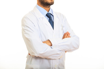 Doctor with crossing arms on white background