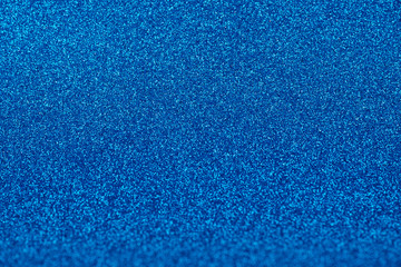 Focused navy blue texture glitter background