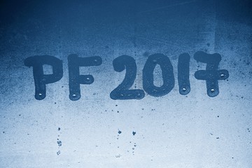 PF 2017 written on a misty window. Background for the celebration of the New Year 2017