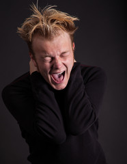 Fototapeta premium Male teenager yelling