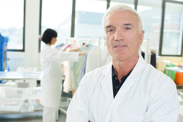 Obraz premium Portrait of senior man in professional laundry