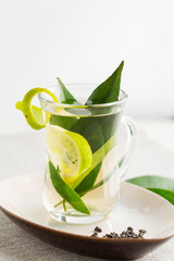 Glass cup of green tea