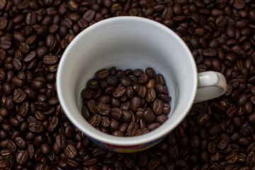 Coffee beans in a cup,cup of coffee with beans