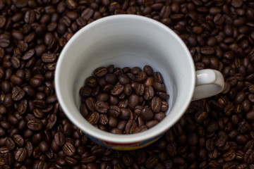 Coffee beans in a cup,cup of coffee with beans