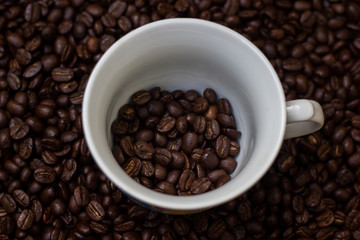Coffee beans in a cup,cup of coffee with beans