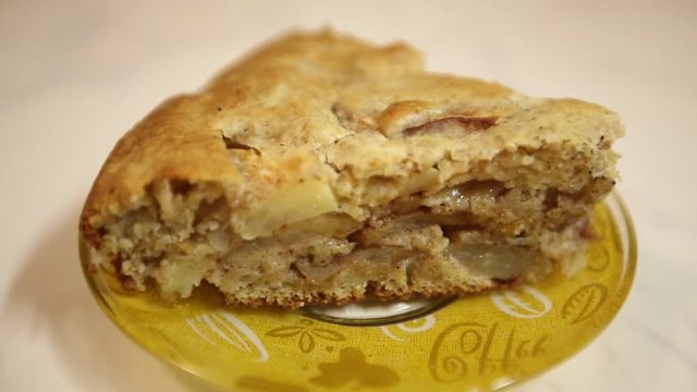 A piece of an apple pie. Preparation of charlotte. Homemade apple cake. Apple pie.