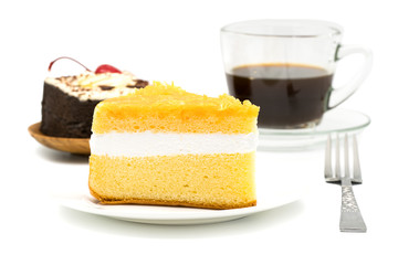Chiffon cake garnished with foi thong in white plate with chocol