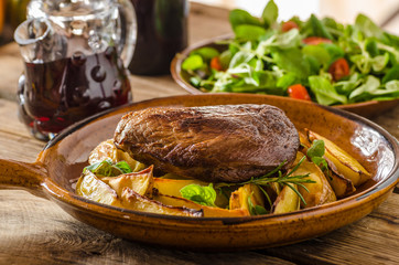 Beef steak with herbs and wine