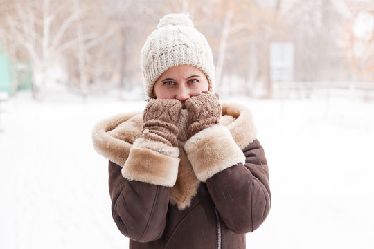 The girl's portrait in the winter in the park