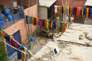 Typical colorful textiles dye in the historic Kasbah of Fes, Morocco, Africa