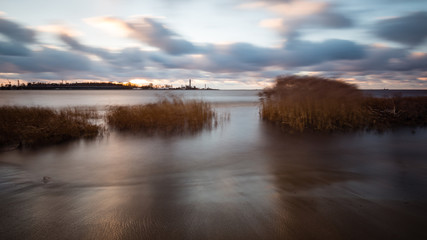 Stormy sea in winter with white waves crushing. long exposure