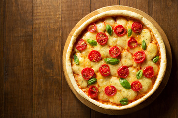 pizza at wooden table