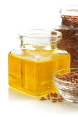 linseed oil in bottle isolated on white