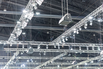 multiple spotlights on a theatre stage lighting.