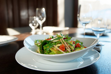 Green salad on restaurant table