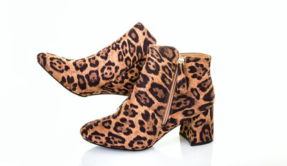 Pair Of Leopard Skin Boots on a White Background