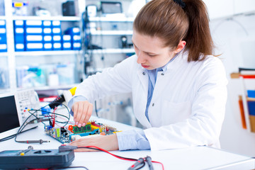 Engineer working with circuits.