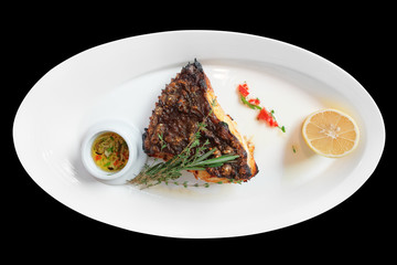 Grilled flounder on white plate, isolated