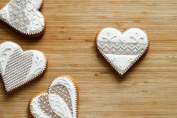 Cookies in the shape of a heart on a wooden background