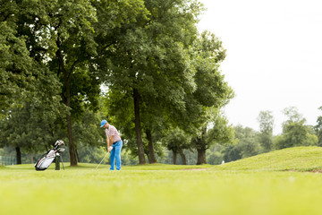 Fototapeta premium Golfer playing on beautiful golf course