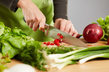Woman chopping vegetables