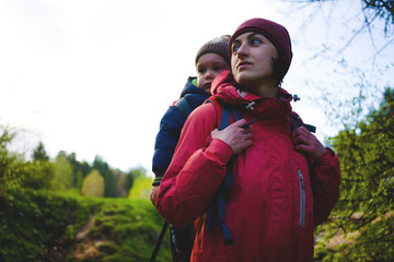 The mother and son are traveling.