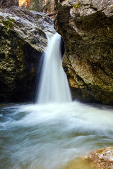 Obraz premium Beautiful mountain waterfall