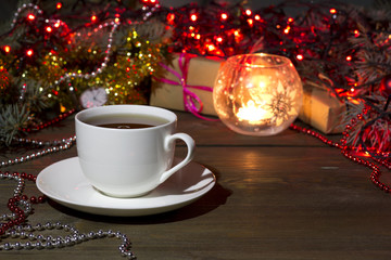 cup of tea on a background Christmas toys