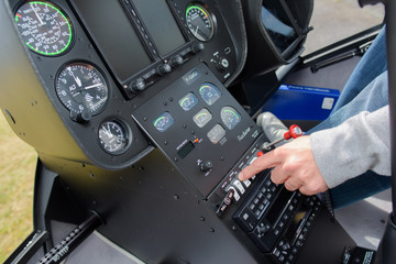 cockpit view of helicopter and pilot