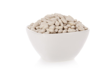 Haricot or Cannellini beans in a bowl isolated on white background
