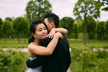 Fototapeta premium Bride and groom on their wedding day outdoors