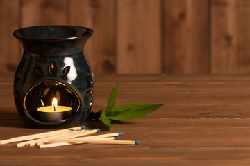 Aroma Lamp With Burning Candle. Aromatherapy. Spa Room.