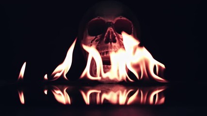 4k Halloween Shot of Skull Burning in Fire Flames