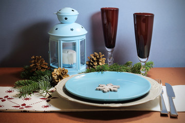 Christmas dinner with a candle and cutlery