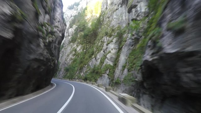 Road in Bicaz Gorge, a narrow pass between historic region of Transylvania and Moldavia in Romania
