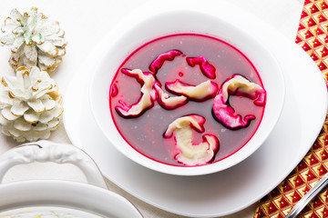 Red borsch with dumplings, traditional Polish Christmas Eve dish