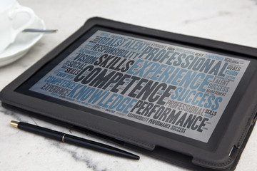 tablet with competence word cloud