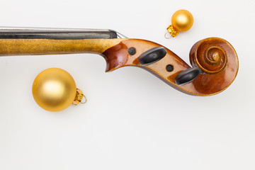 Top view close up shot of old violin and Christmas decoration.