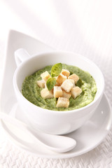green cream, soup with croutons  