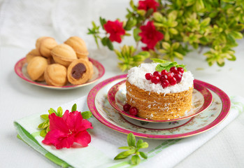 Breakfast with pastries and a drink on a light background