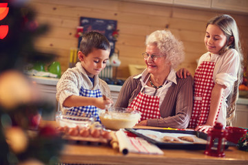 Baking xmas cookies with grandmother on Christmas.