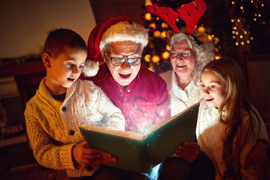 Family Reading Christmas Magic Book.