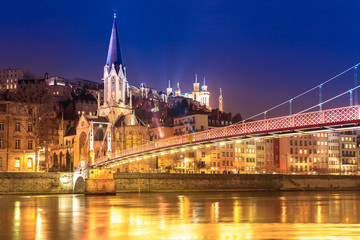 View of Saone river, Famous church in Lyon city at evening
