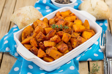 Roasted pumpkin with herbs and tomato puree