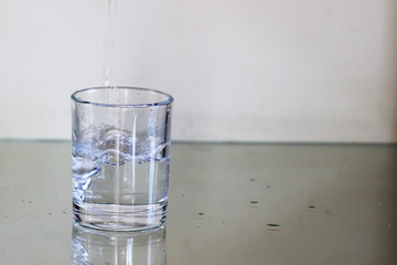 Pour the drink into a glass