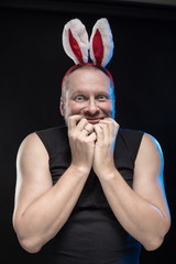 Comic actor with bunny ears, on the eve of Christmas and New Year